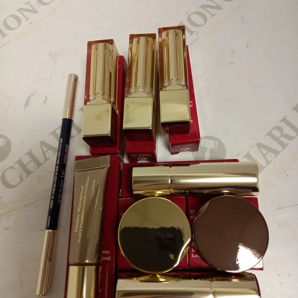 LOT OF APPROX 9 TO INCLUDE CLARINS IRIDESCENT EYESHADOW , CLARINS LIPSTICK , ETC
