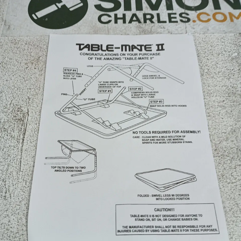 TABLE-MATE II FOLDING TABLE STAND – WHITE, IN PACKAGING