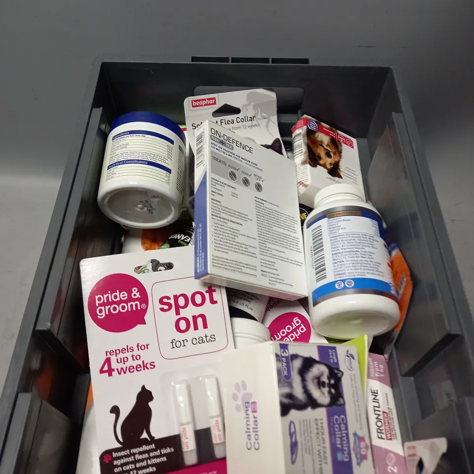 TOTE OF ASSORTED PET SUPPLIES TOO INCLUDE CALMING COLLAR , DOG TABLETS , FLEA COLLAR , ETC 