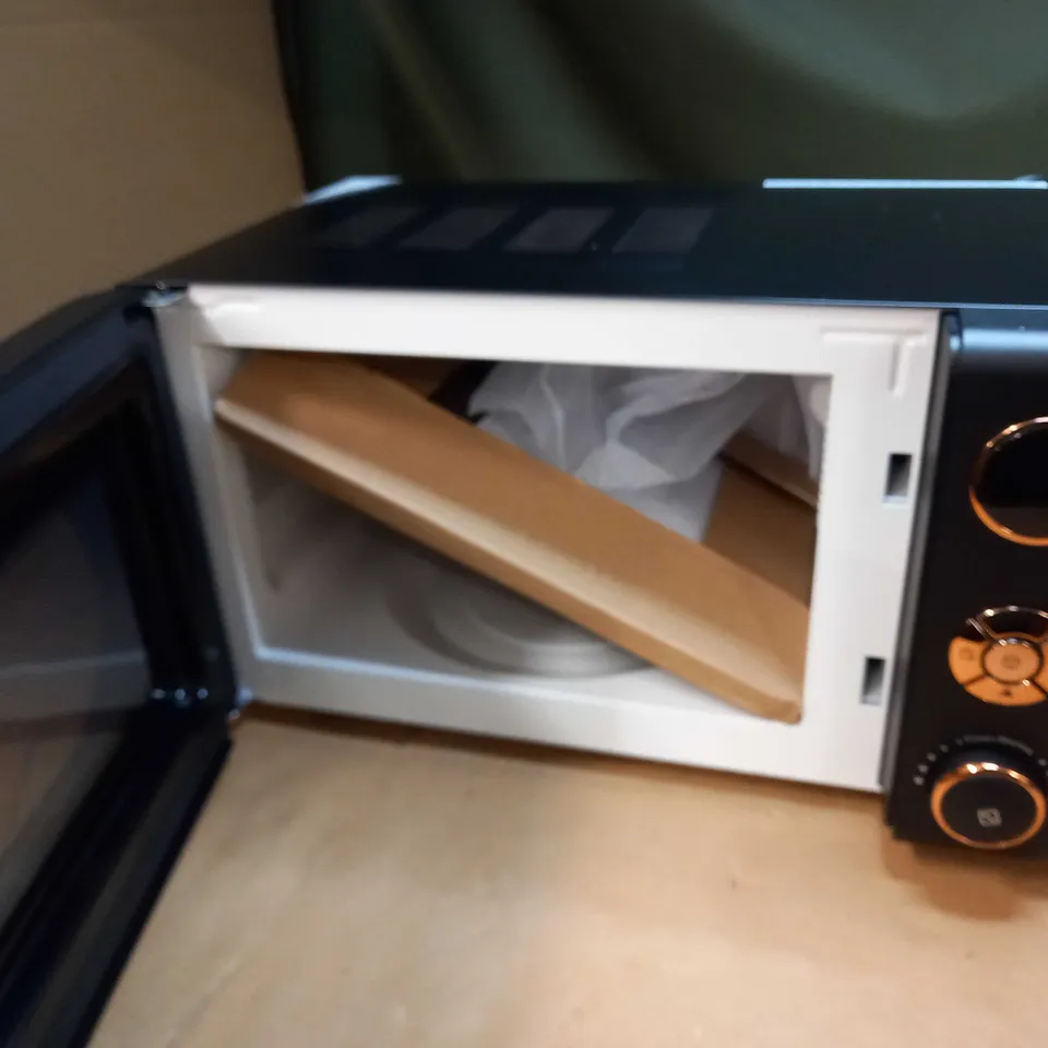 BLACK AND COPPER MICROWAVE 