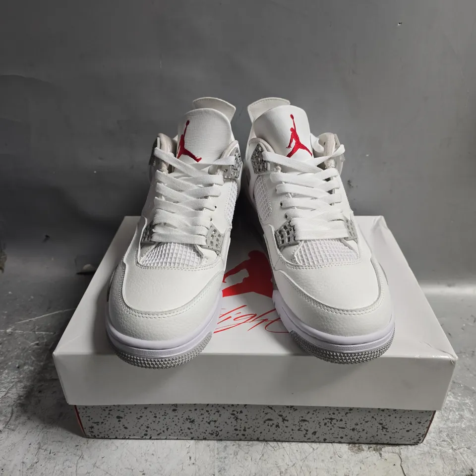 BOXED PAIR OF NIKE JORDAN RETRO 4 TRAINERS IN WHITE - UK 10