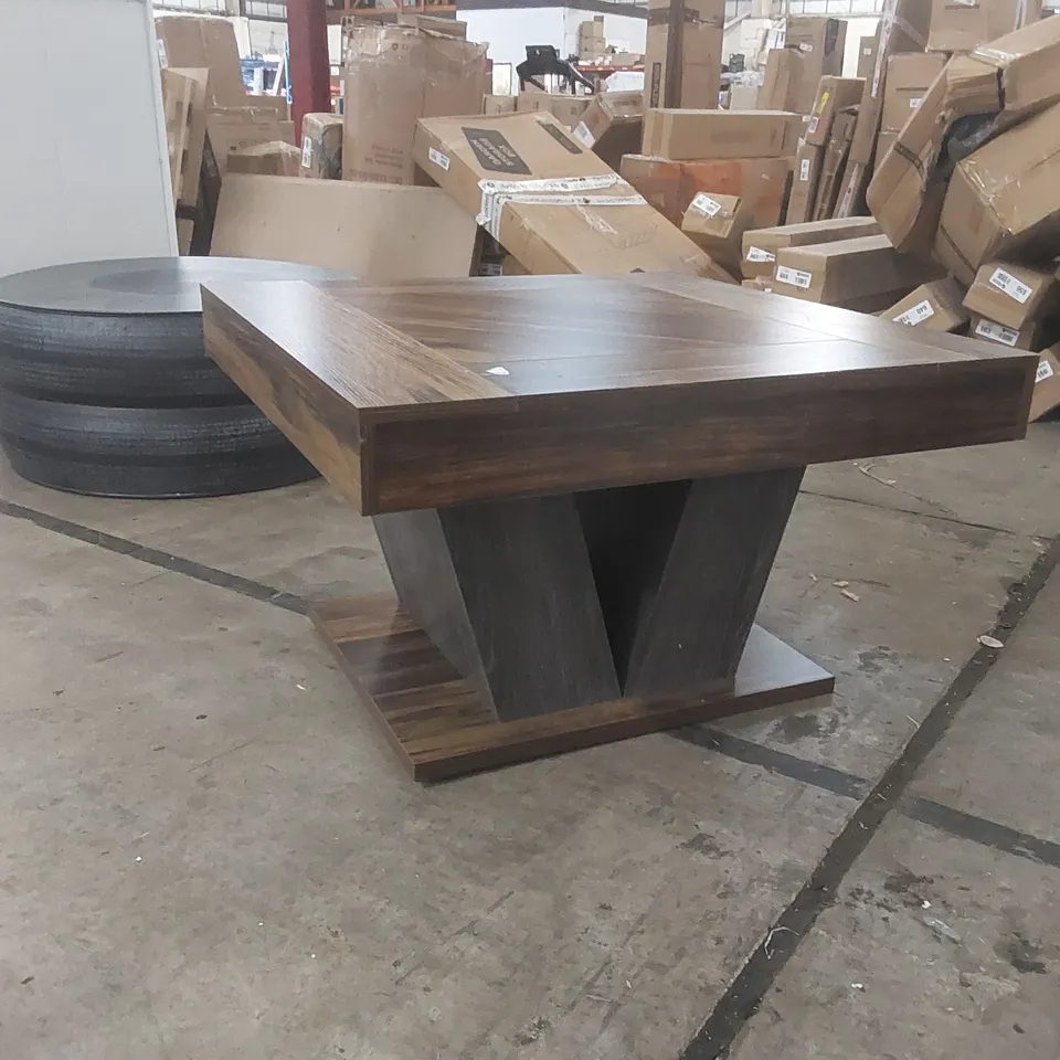 TRIBESIGNS SQUARE COFFEE TABLE WITH A RUSTIC BROWN TOP AND A DARK GRAY V-SHAPED BASE