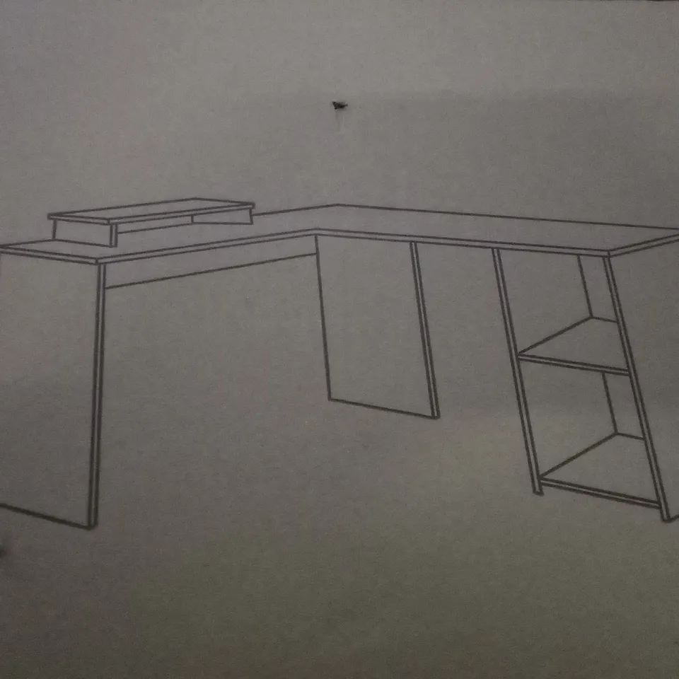 PALLET OF APPROXIMATELY 18 BOXED L-SHAPED COMPUTER DESKS