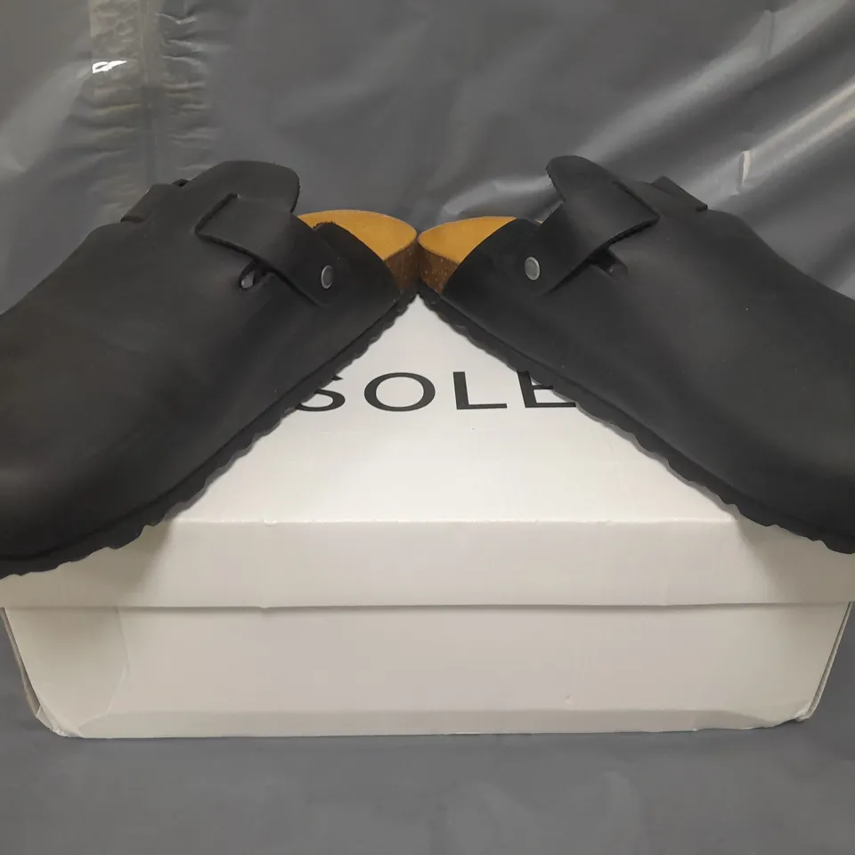 BOXED PAIR OF SOLE SHOES IN BLACK EU SIZE 42