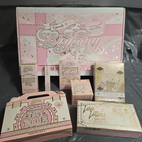 BOX OF 7 ASSORTED PLOUISE COSMETICS TO INCLUDE - TINY TOOLS BRUSH SET - MINI ME MAKEUP REMOVER - BESTIE TINTED BEAUTY BALM IN SHADE 3 - ETC