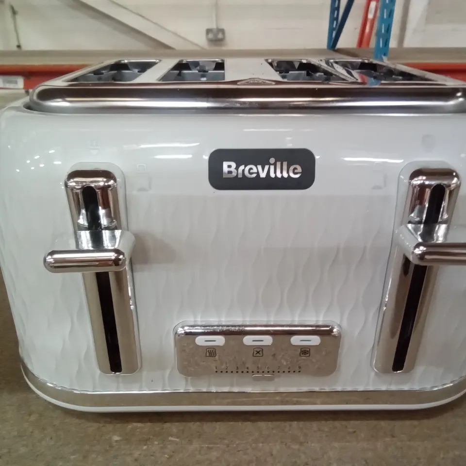 BOXED DĒLONGHI FOUR SLICE TOASTER