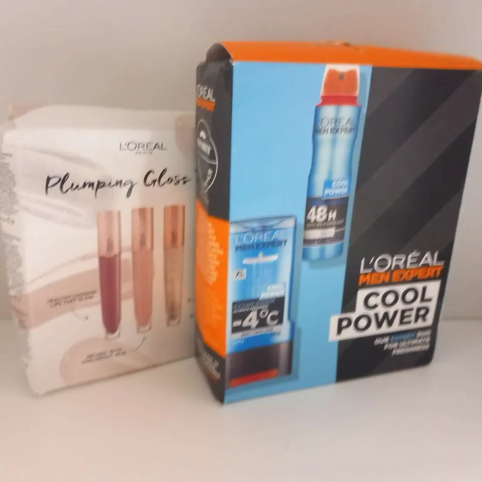 FOUR ASSORTED L'OREAL PRODUCTS TO INCLUDE; COOLL POWER AND PLUMPING GLOSS TRIO