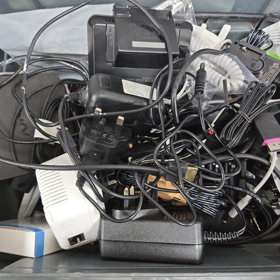APPROXIMATELY 12 ASSORTED HOUSEHOLD ITEMS TO INCLUDE BATTERY CHARGERS, CABLES, SKY BOX, ETC