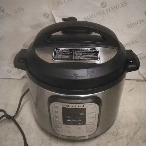 BOXED INSTANT POT MULTI USE PRESSURE COOKER