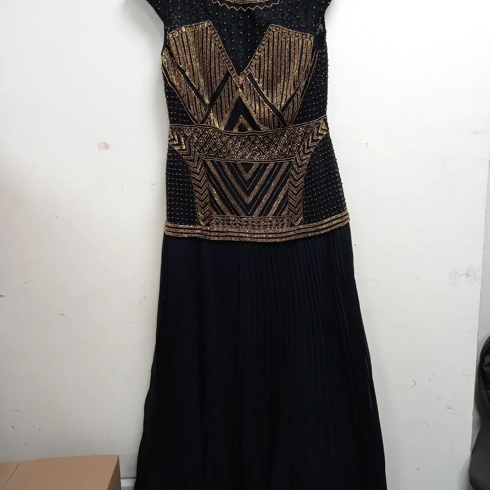 KAREN MILLEN EMBELLISHED PLEATED MAXI DRESS IN BLACK/GOLD - SIZE 12