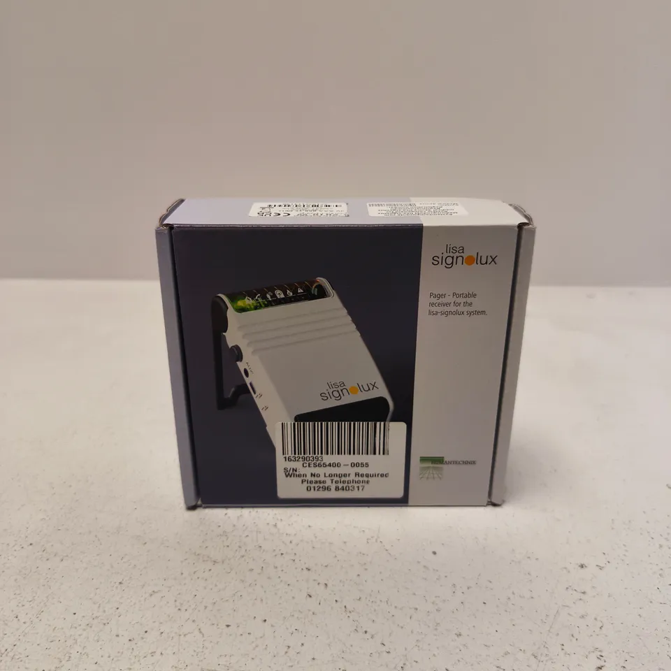 BOXED .LISA SIGNOLUX PORTABLE VIBRATING RECEIVER