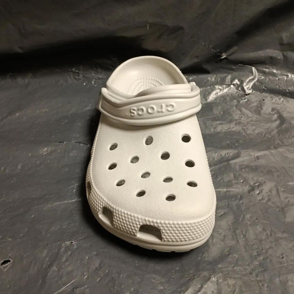 PAIR OF CROCS CLASSIC CLOGS IN GREY SIZE UK M6/W7