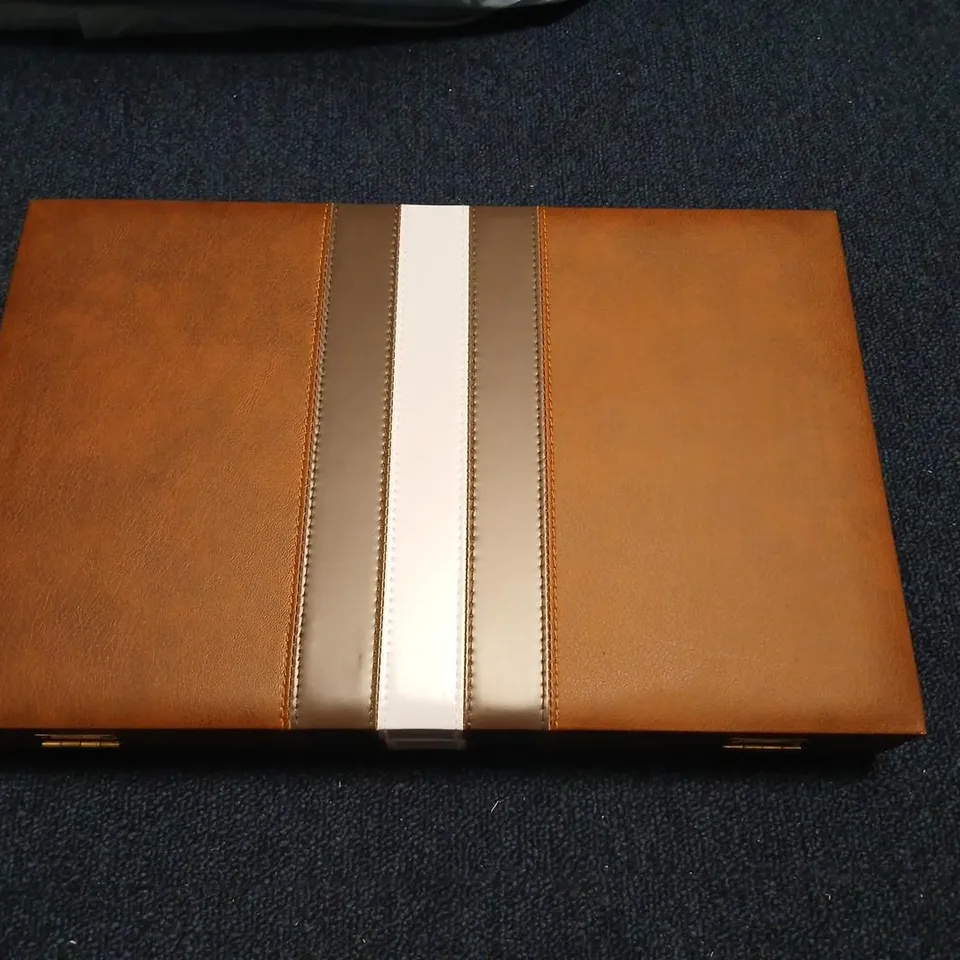 BACKGAMMON SET IN BROWN LEATHER CASE WITH DICE CUPS AND INSTRUCTION SHEET