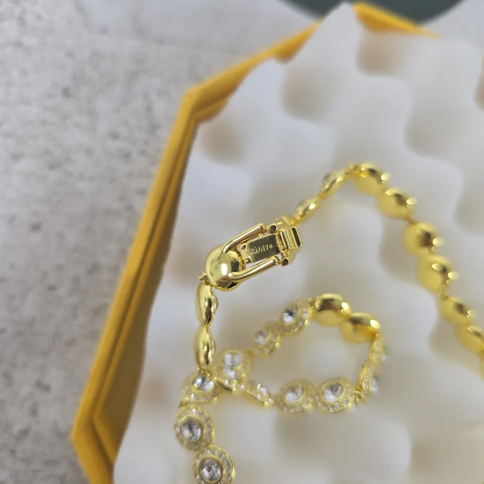SWAROVSKI GOLD-TONE CRYSTAL NECKLACE – BOXED