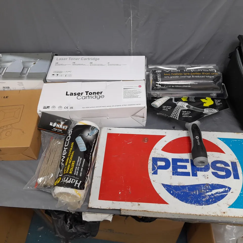 BOX OF APPROXIMATELY 15 ASSORTED HOUSEHOLD ITEMS TO INCLUDE VANQUISH ROLLER, LASER TONER CARTRIDGE, AND LED FLOODLIGHT ETC. 
