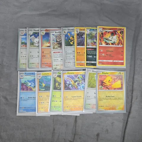 SMALL ASSORTMENT OF COLLECTIBLE POKΓMON TRADING CARDS