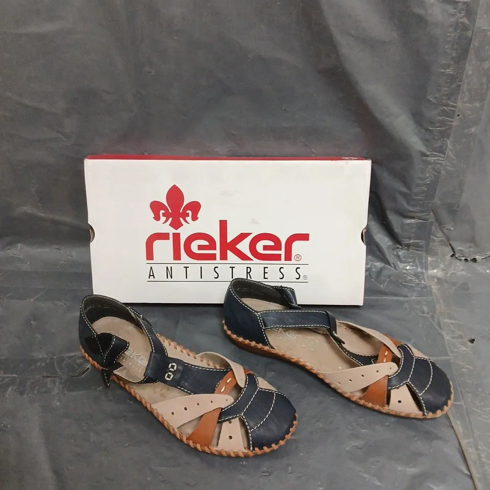 BOXED PAIR OF RIEKER OPEN SEWN SHOE BLUE - SIZE 5 