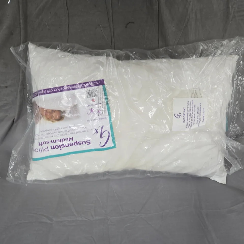 WHITE SUPPORT PILLOW IN SEALED PLASTIC PACKAGING