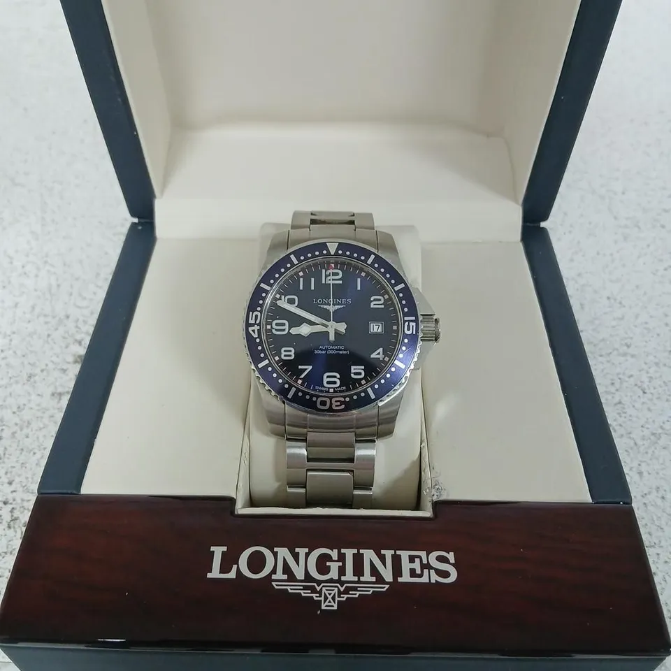LONGINES AUTOMATIC WRISTWATCH – STAINLESS STEEL, BLUE BEZEL, BOXED
