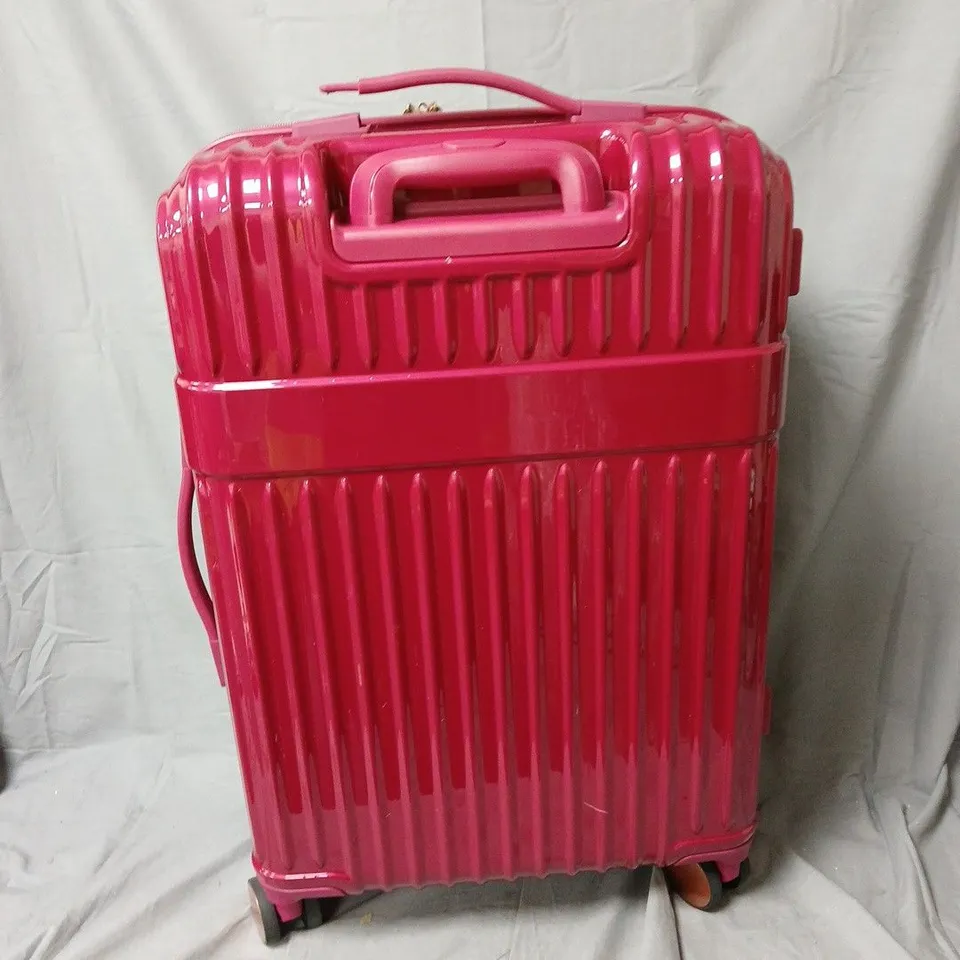 ROCK PINK HARD-SHELL LUGGAGE SUITCASE WITH TOP HANDLE AND 4-WHEEL ROLLERS-ONE SIDE OF HANDLE NOT ATTACHED 