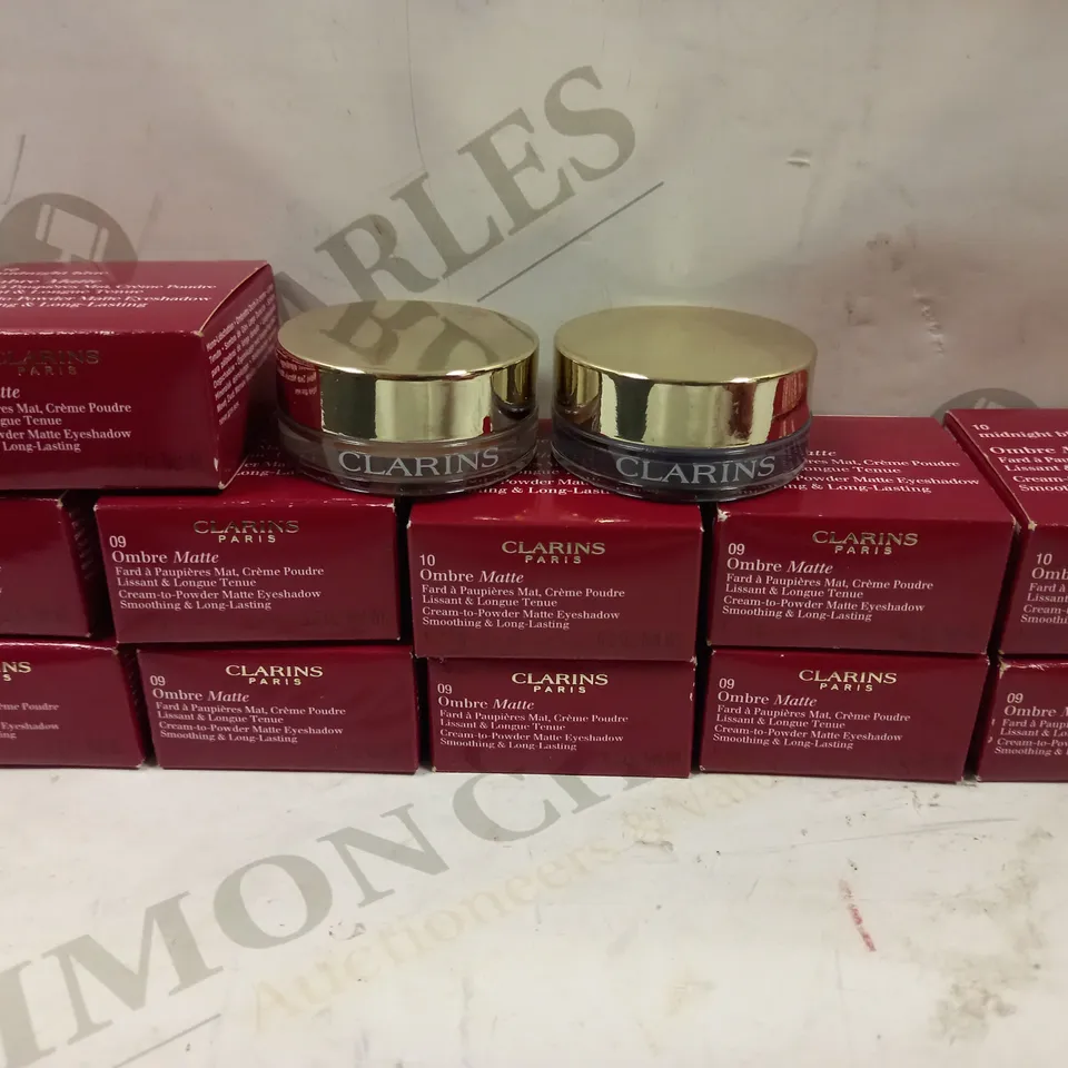 LOT OF 11 CLARINS OMBRE MATTE 7G EYESHADOW TO INCLUDE 7 IVORY-09 AND 4 MIDNIGHT BLUE-10
