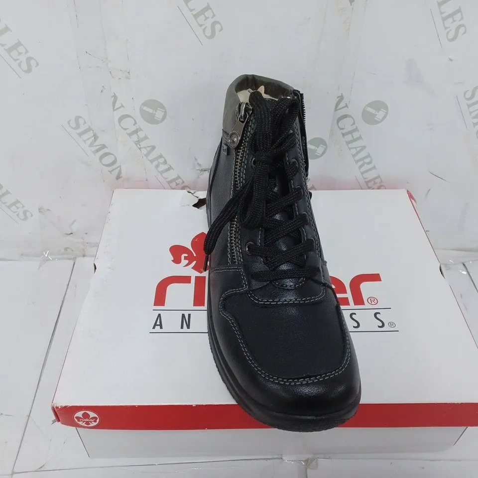 BOXED PAIR OF RIEKER WATER RESISTANT BOOTS IN BLACK SIZE 7.5 