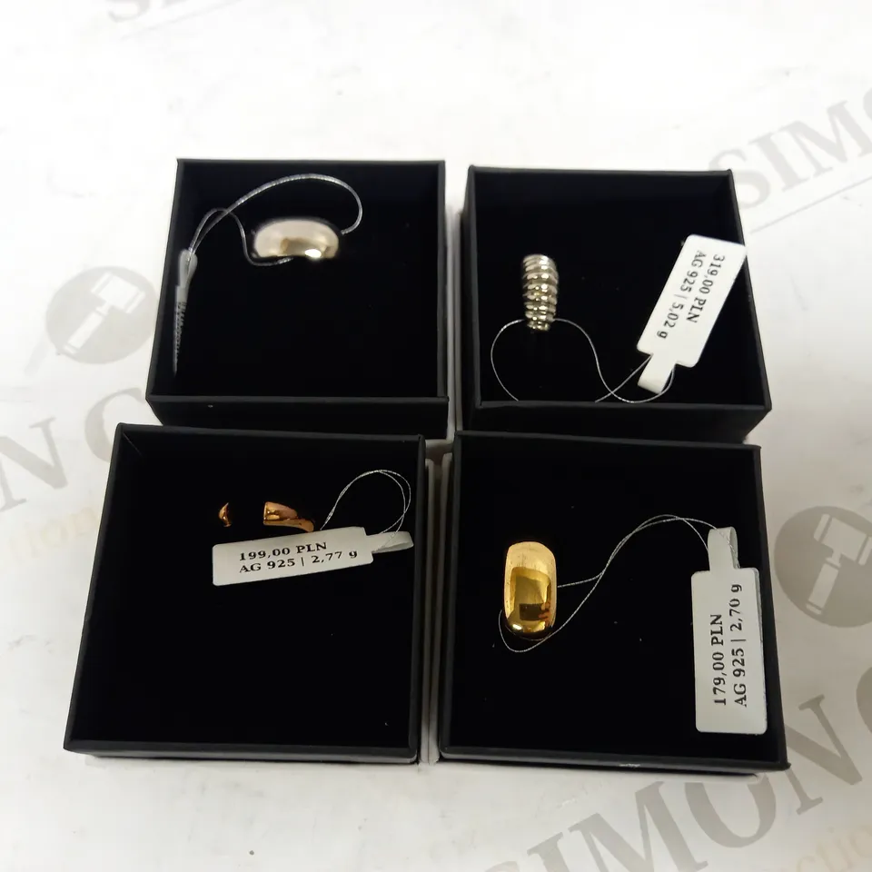 LOT OF 4 GIORE RINGS