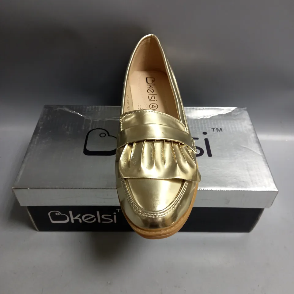 BOXED KELSI LADIES FLAT GOLD BROGUES. SIZE 4