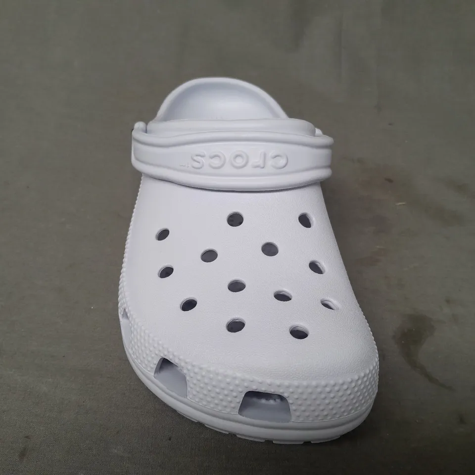 PAIR OF CROCS CLASSICS IN PALE BLUE UK SIZE M3/W4