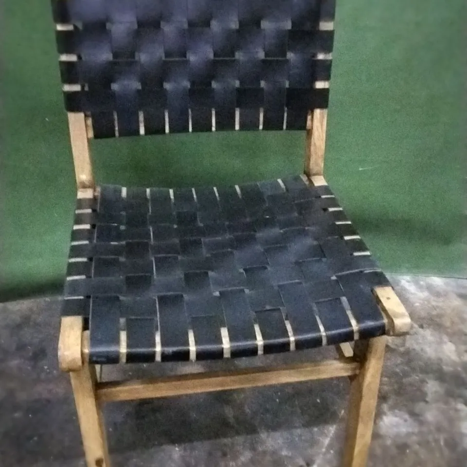 SIX DESIGNER WOODEN FRAMED DINING CHAIRS WITH BLACK WEAVED LEATHER SEAT AND BACK PADS AND STUDDED DETAIL