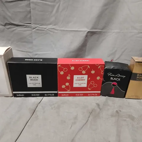APPROXIMATELY TEN ASSORTED BOXED FRAGRANCES TO INCLUDE; AVON, CUPID AND DARK FORD