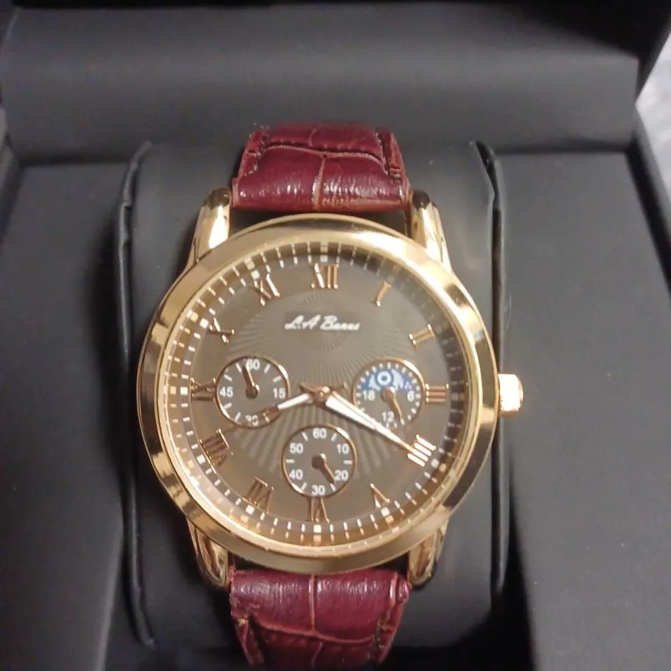 BOXED L.A BANUS WATCH BLACK FACE WITH ROSE GOLD DIAL ROSE GOLD BEZEL AND RED STRAP 