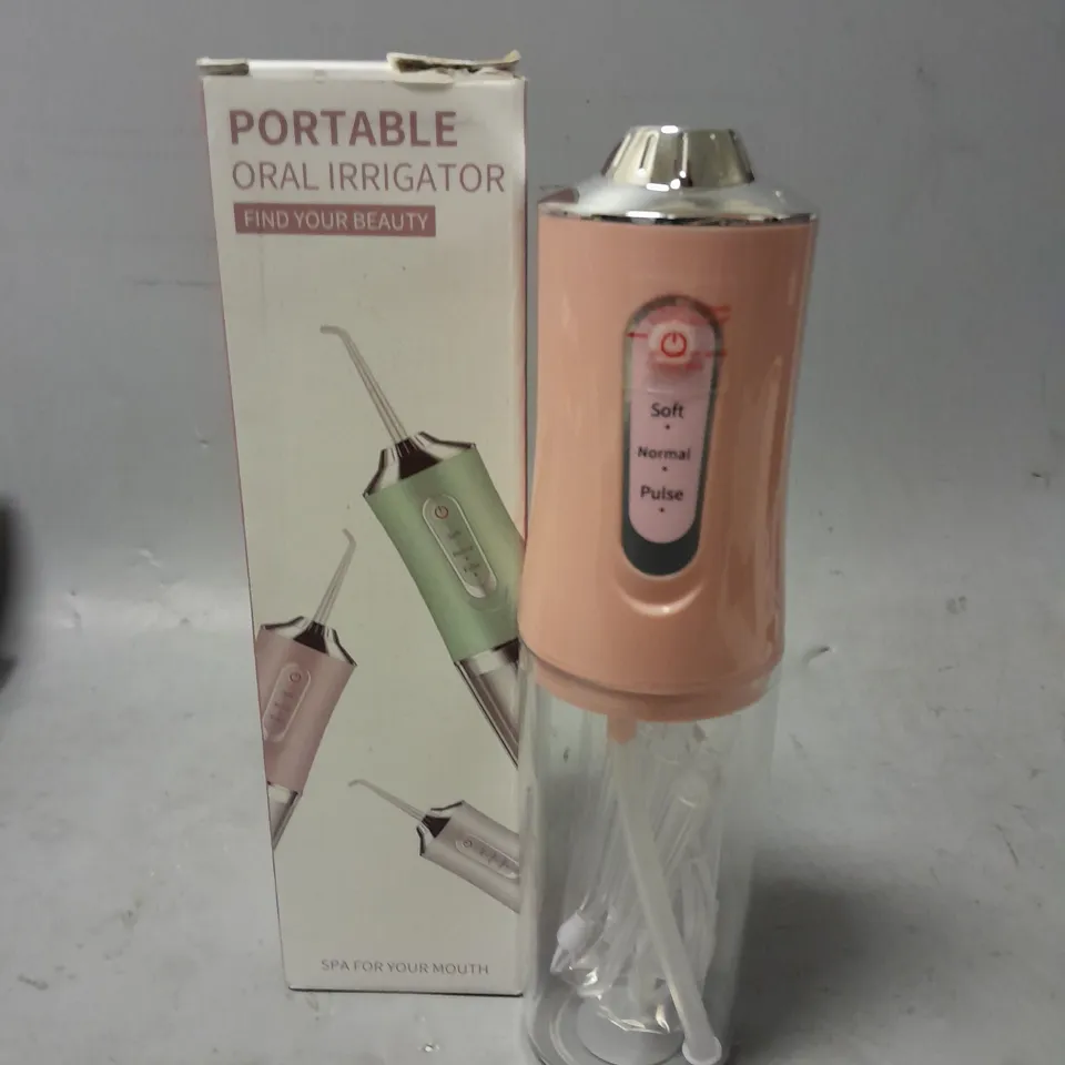 PORTABLE ORAL IRRIGATOR 