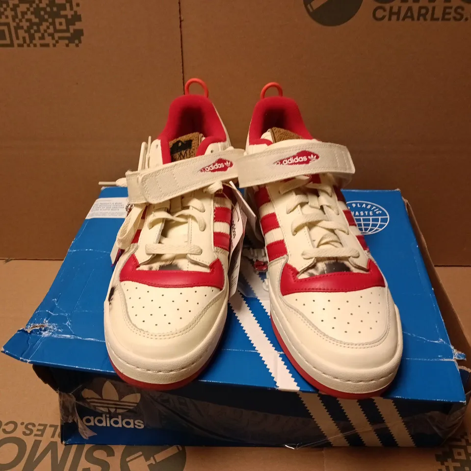 BOXED PAIR OF ADIDAS FORUM HOME ALONE TRAINERS IN WHITE - UK 11