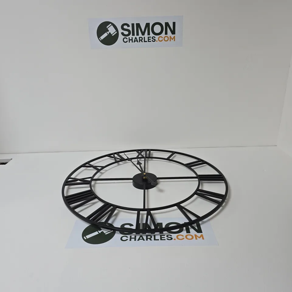 BLACK METAL CIRCULAR SKELETON WALL CLOCK – OPEN-FACE DESIGN