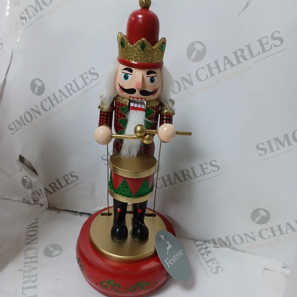 BOXED FESTIVE 32CM WOODEN ANIMATED MUSICAL NUTCRACKER