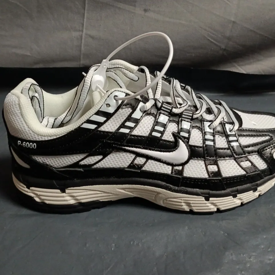 PAIR OF NIKE P-6000 TRAINERS – UK SIZE 5