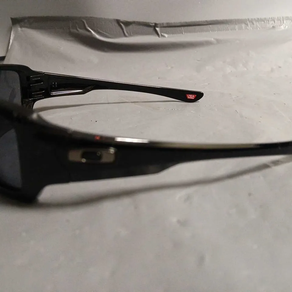 PAIR OF OAKLEY BLACK FRAMED GLASSES