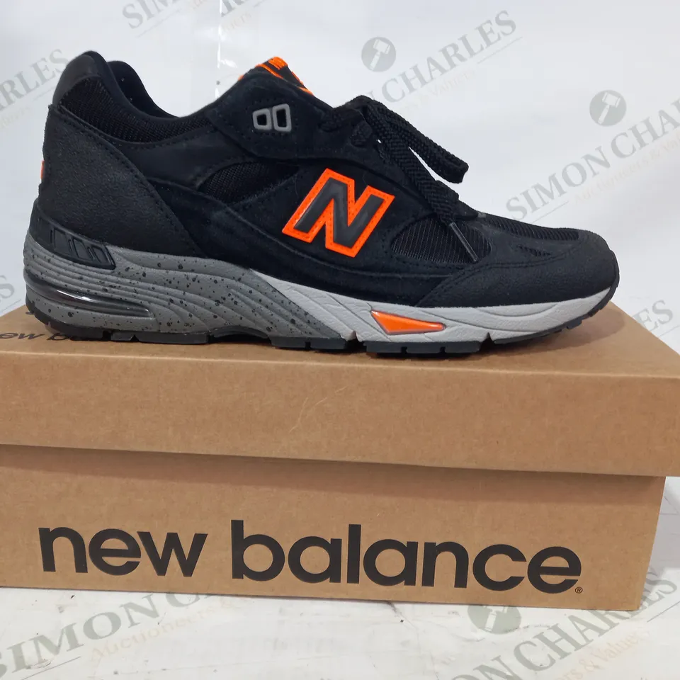 BOXED PAIR OF NEW BALANCE 991 SHOES IN BLACK/ORANGE UK SIZE 7