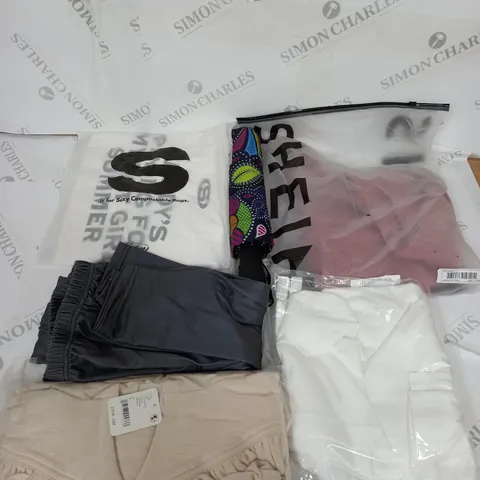 LARGE BOX OF ASSORTED CLOTHING ITEMS IN VARIOUS COLOURS AND SIZES INCLUDING TROUSERS , TOPS AND JUMPERS