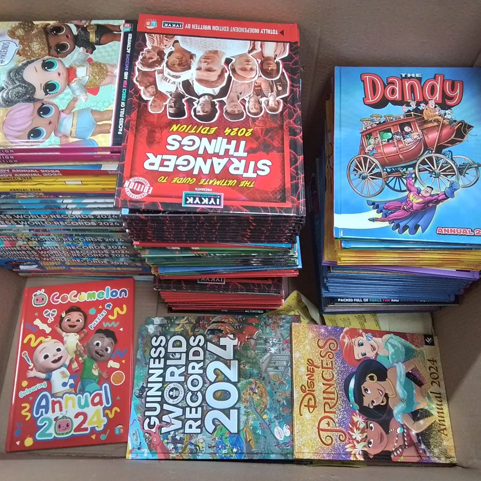 LARGE QUANTITY OF ASSORTED 2024 ANNUALS TO INCLUDE LOL SURPRISE, GUINESS RECORDS, DISNEY PRINCESS AND COCOMELON