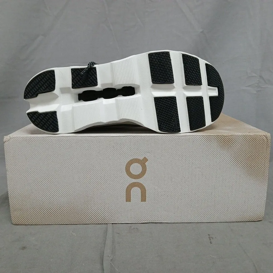 BOXED PAIR OF ON CLOUDMONSTER SHOES IN WHITE SIZE UK 4