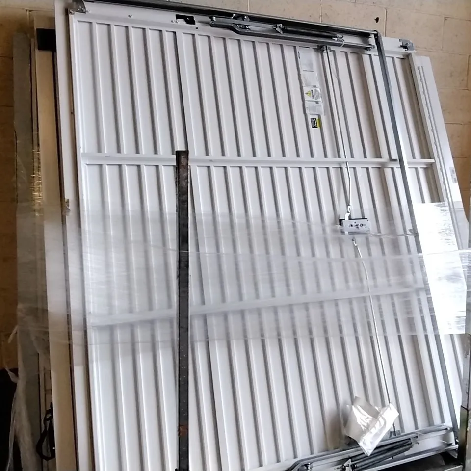 WHITE METAL GARAGE DOOR APPROXIMATELY 230 X 200CM