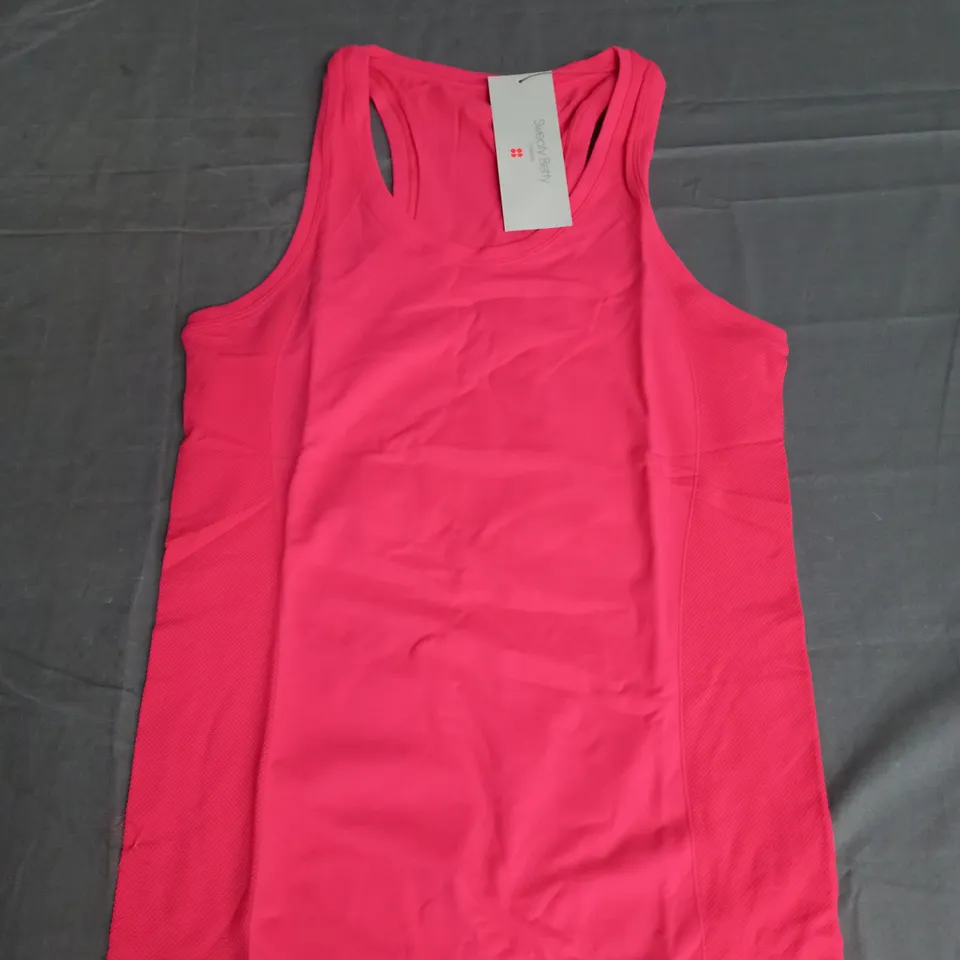 SWEATY BETTY ATHLETE SEAMLESS WORKOUT TANK TOP IN CORAL PINK SIZE M