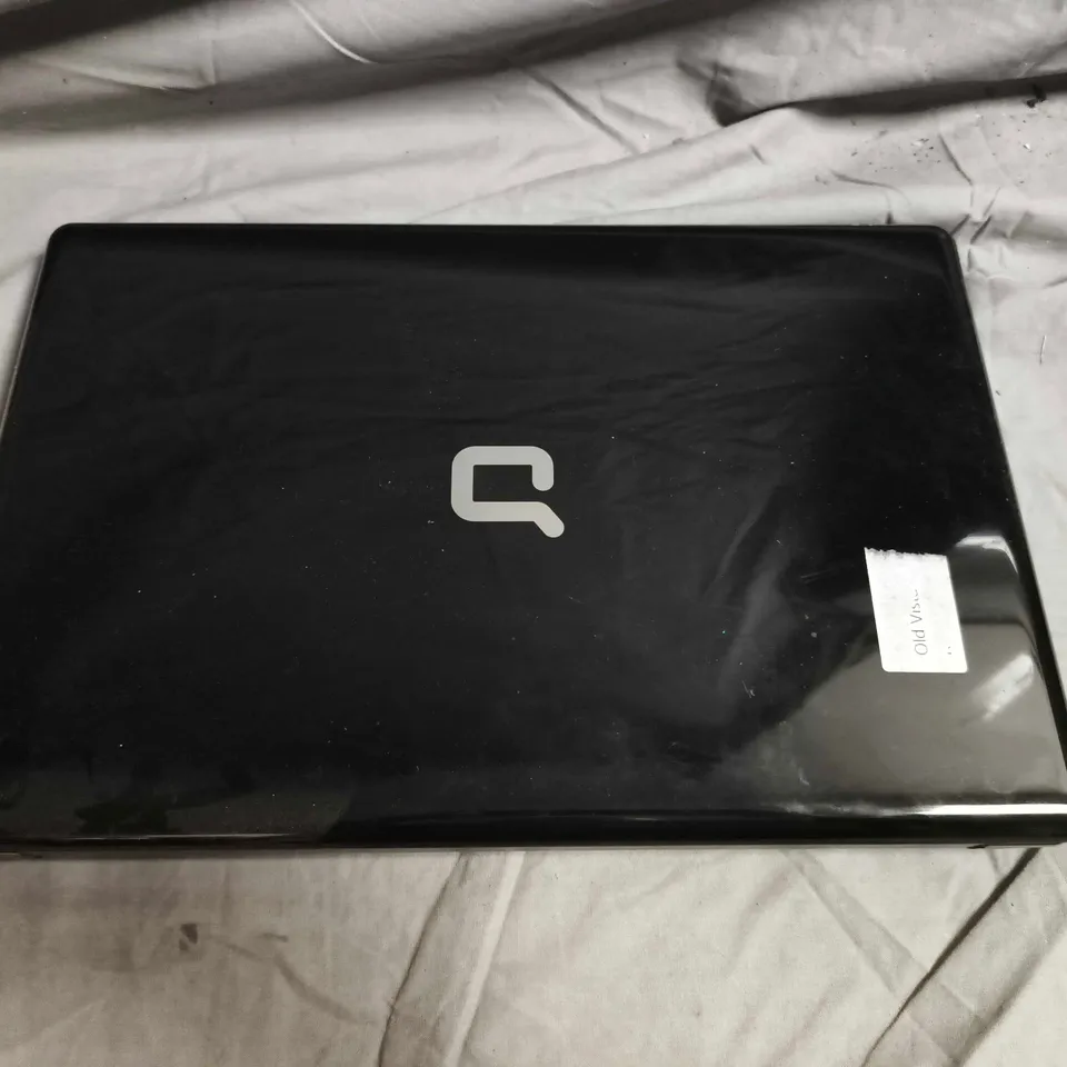HP COMPAQ LAPTOP – BLACK, WINDOWS VISTA ERA STICKERS