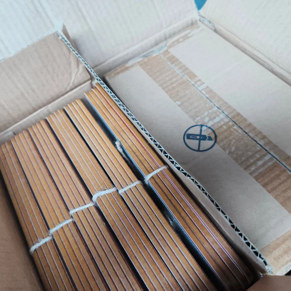 APPROXIMATELY 12 PACKS OF GISELA GRAHAM PLACEMATS (4 IN EACH PACK)