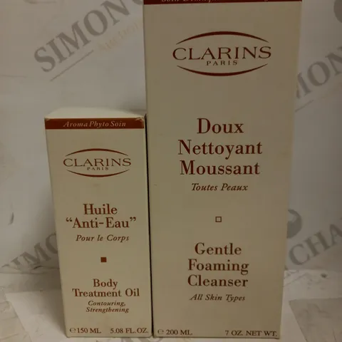 LOT OF 2 ASSORTED CLARINS PRODUCTS TO INCLUDE BODY TREATMENT OIL 150ML & GENTLE FOAMING CLEANSER 200ML