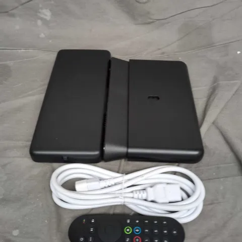 BOX OF APPROX 5 ASSORTED HOUSEHOLD ITEMS TO INCLUDE WIRES, REMOTES AND EE BOXES