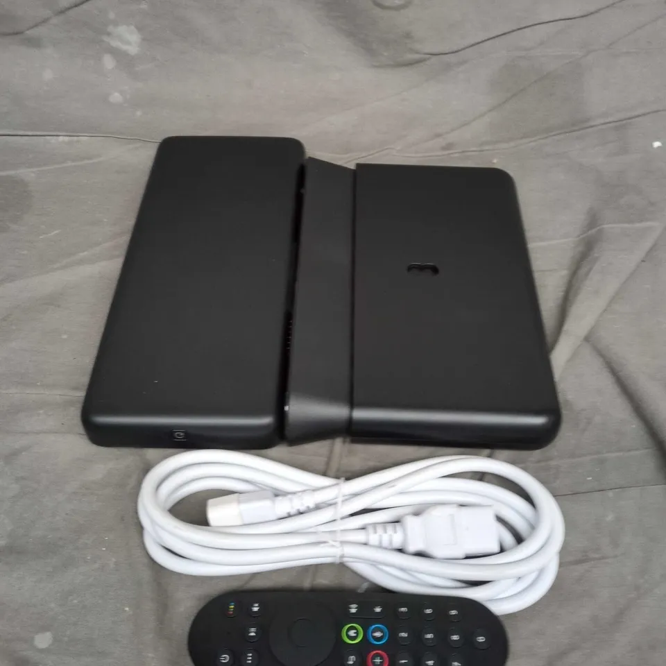 BOX OF APPROX 5 ASSORTED HOUSEHOLD ITEMS TO INCLUDE WIRES, REMOTES AND EE BOXES