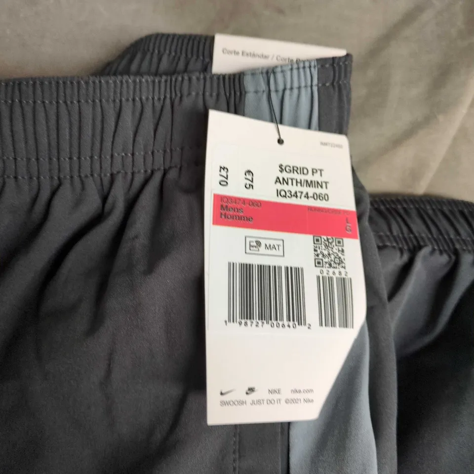 NIKE GRID PANTS – MEN'S ANTH/MINT 